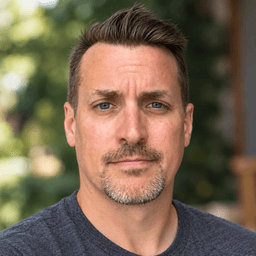 Headshot of Phil Guldberg
